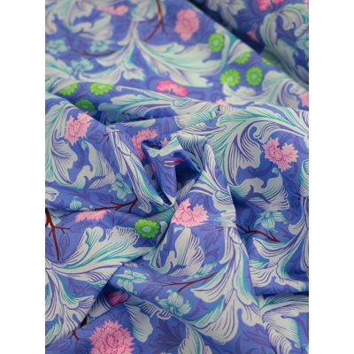 Close-up of Kaffe Fassett X William Morris Cotton Lawn Fabric – Leicester Cobalt, featuring an intricate botanical pattern in rich cobalt blue on finely woven cotton.
