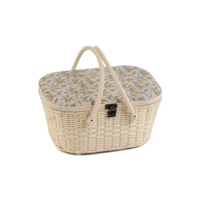 Large wicker sewing box in William Morris Lemons print with raffia-effect handles, a built-in pincushion, and organised storage compartments.